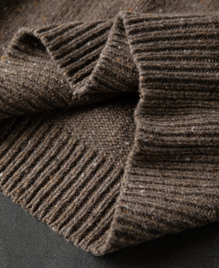 rib-knit hem detail of Roll Neck Pure Wool Fisherman Sweater