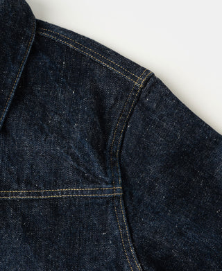 Shoulder detail of the heavyweight type 1  indigo denim jacket, showing the textured fabric.