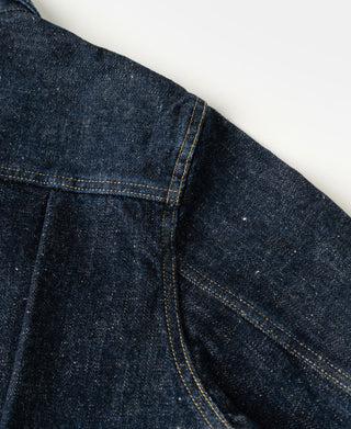 Dark indigo type 1 denim jacket's fabric and shoulder details.
